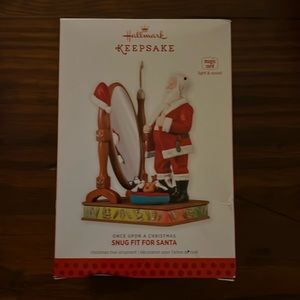 Hallmark keepsake snug fit for Santa. Once upon a Christmas